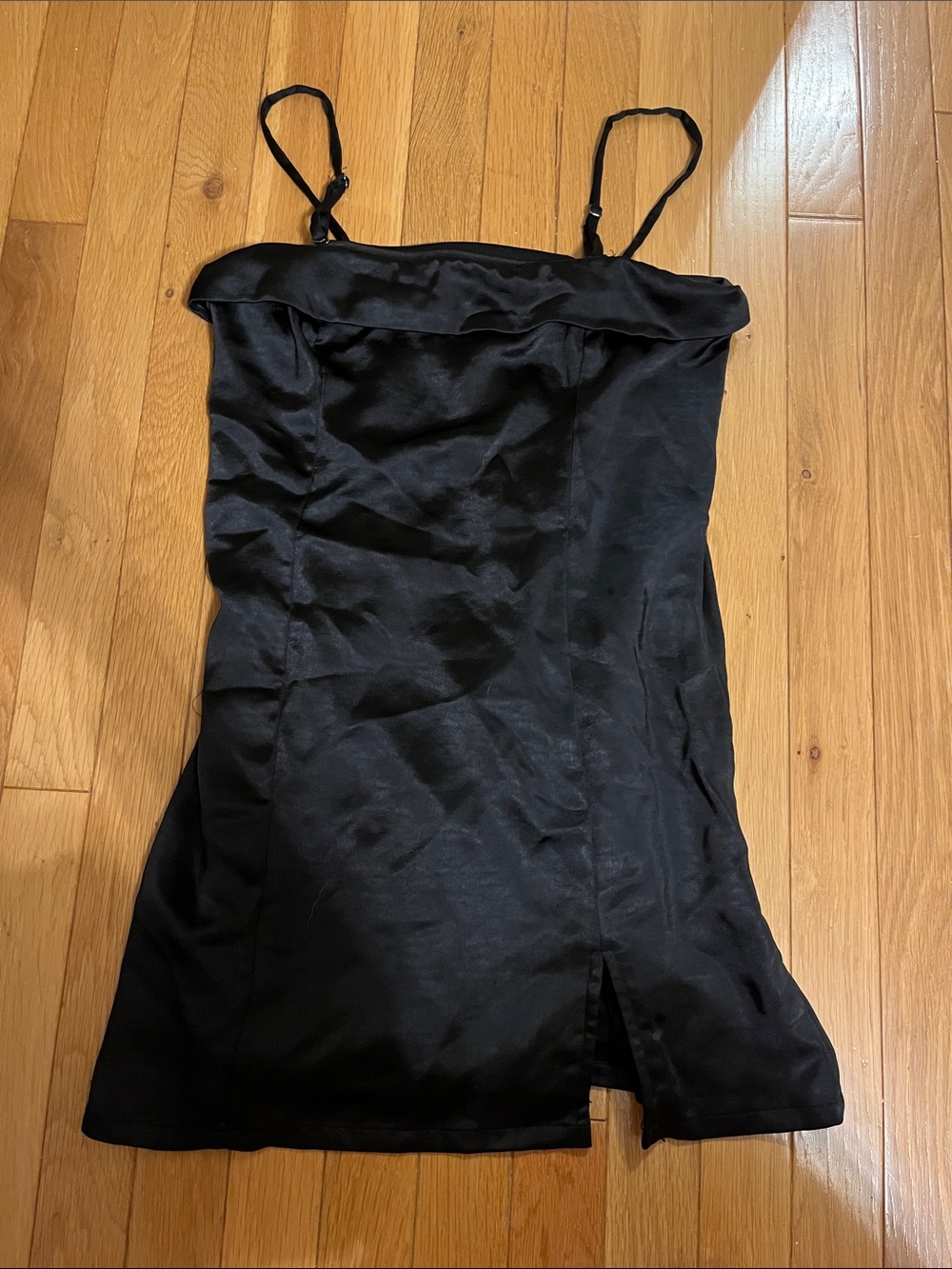 Black satin mini dress with a slit
